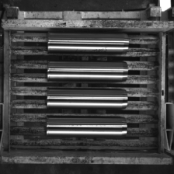 neatly arranged cylindrical shafts